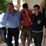 Michalis Sarris being arrested in 2011.